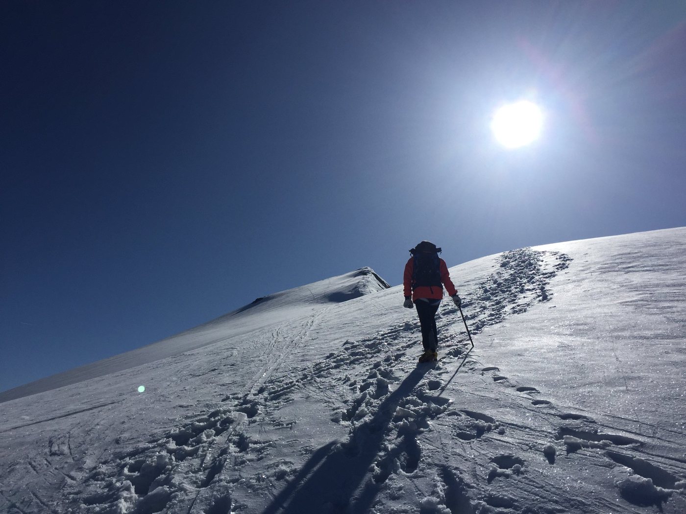 Christina Kehl climbing a steep snowfield